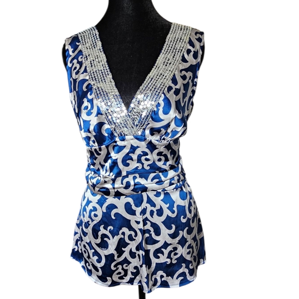 Bebe Blue and White Patterned Blouse